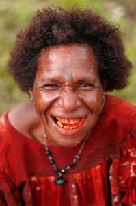 Woman with red stained teeth, PNG. Photo by Ian @ ThePaperBoy. Licence: CC BY 2.0