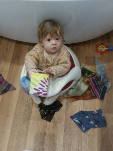 Xanthe playing with her fabric pull-box at home. Photo: Jenny Wade