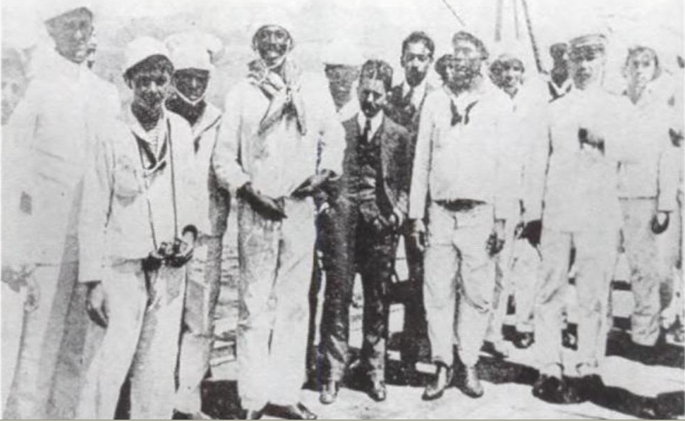 Joao Candido (fourth from left) with reporters, officers and sailors on the battleship, Minas Gerais, 26 November 1910, the final day of the mutiny