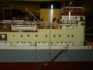 Side view: showing white Plimsoll Line underneath the walkway