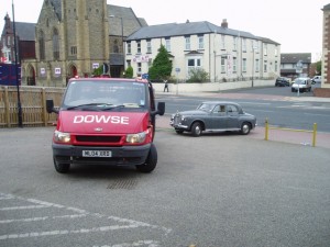 As it is too heavy to push up the bank into the car park it is towed in by the specialist lifting company hired to ramp the Rover into the CCT.