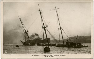 Postcard of Wellesley sunk at her moorings after the fire.