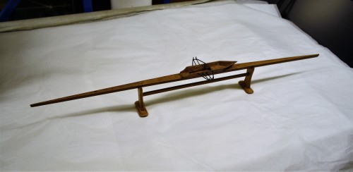 Model of a fixed seat skiff (single scull) c.1860. This simple, but elegant, solid hulled model is representative of the type of boat used by Harry Clasper, Robert Chambers and James Renforth. TWCMS : B9758 Scale 1:12